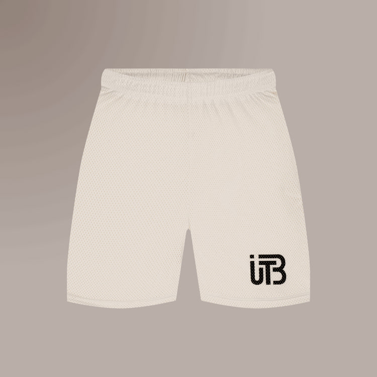 TBIU Mesh Shorts in minimal style -  Ivory , relaxed fit, polyester mesh, with internal draw cords. Model wearing size S.