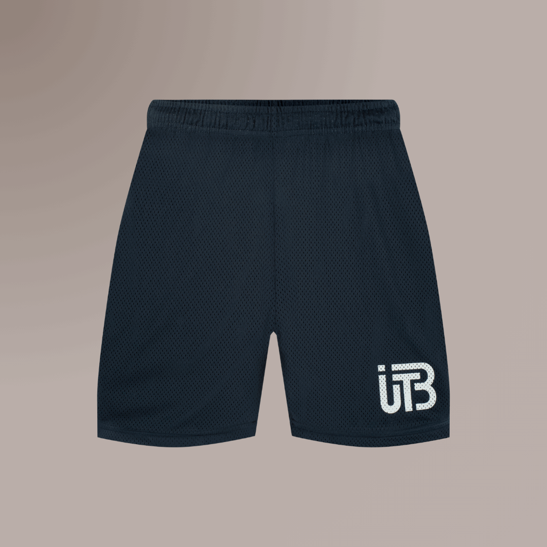 TBIU Mesh Shorts in minimal style - Midnightblue , relaxed fit, polyester mesh, with internal draw cords. Model wearing size S.