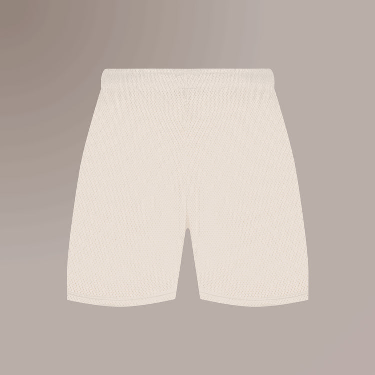 TBIU Mesh Shorts in minimal style -  Ivory , relaxed fit, polyester mesh, with internal draw cords. Model wearing size S.